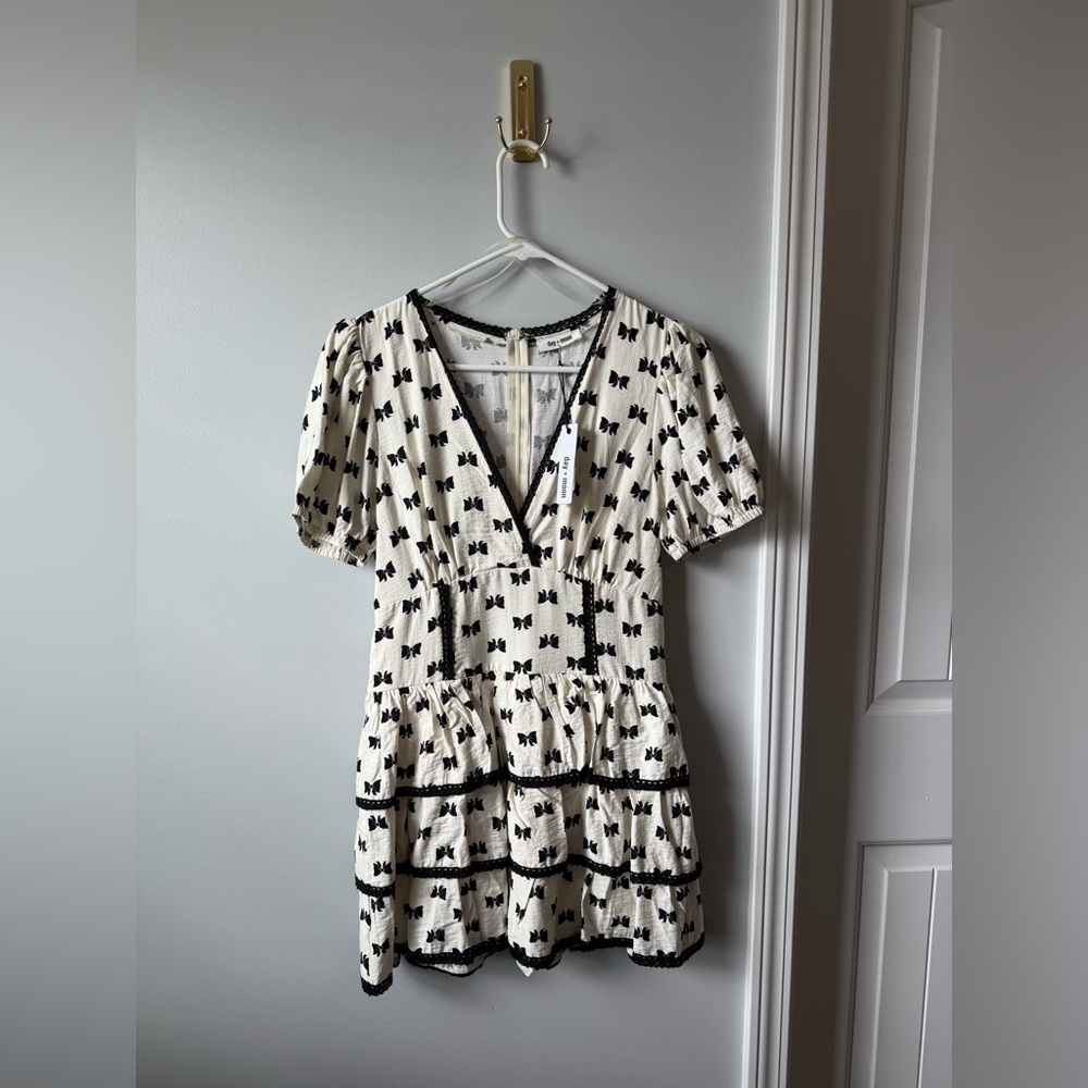Chic Black and White Bow Romper